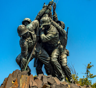 Washington DC, USA; June 2, 2023: The United States Marine Corps Iwo Jima War Iwo Jima Memorial at Arlington (Virginia), carrying the flag.