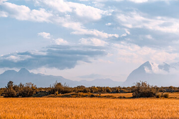 Mountain landscape with fields and cloudy sky. Turkey landscape