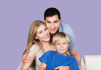 Young smiling happy parents with child