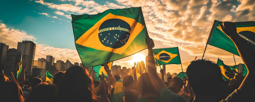 people waving brazilian flag at event