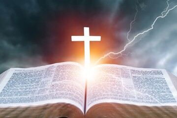 Dramatic Christian Cross light and Bible book