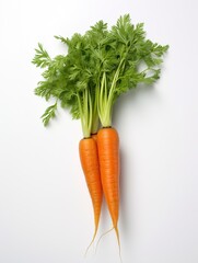 Three orange carrots with green leaves on a white background