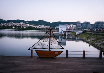 Park on the Artificial Lake, Tirana . The love boat, sunset time
