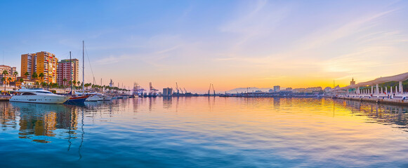 The scenic dusk over Malaga port, Spain