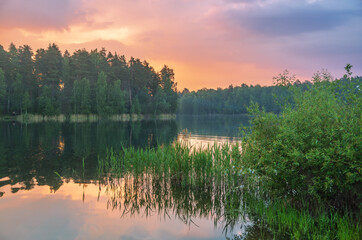 Sunset around the summer lake - 705271948