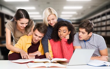 Confident group of college students sitting at classroom