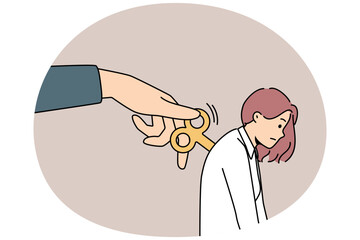 Huge hand wind up key in tired female employee back feeling exhausted. Unhappy woman feel tired and worn out, being started with side help. Vector illustration.