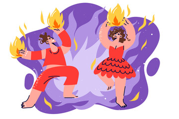 Fire show from couple man and woman dancing rhythmically to music with fire in hands.