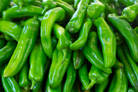 Screensaver with green hot chili pepper. Close-up image