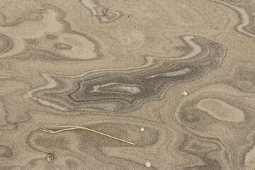 Natural pattern on the beach sand, black and white.