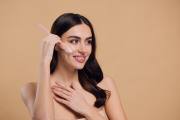 Half naked woman, face and brush cream for beauty