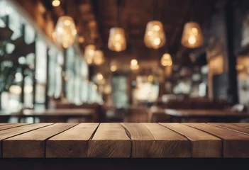 Keuken foto achterwand Muziekwinkel Empty old wood table top and blurred bokeh cafe and coffee shop interior background with vintage