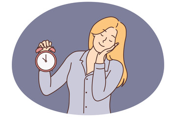 Sleepy woman with clock
