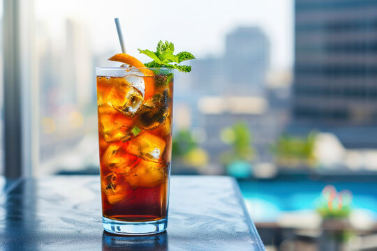 Long Island Iced Tea on rooftop, an image featuring a Long Island Iced Tea against the backdrop of a stylish rooftop bar or lounge.