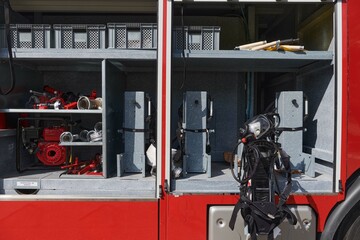 A state-of-the-art firetruck, equipped with advanced rescue technology, stands ready with its...