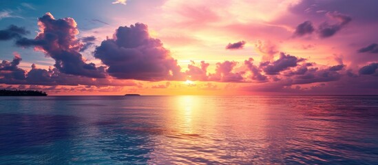 Vivid sunset above Maldives' sea.