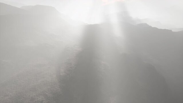 desert landscape of the Pamir Mountains in fog