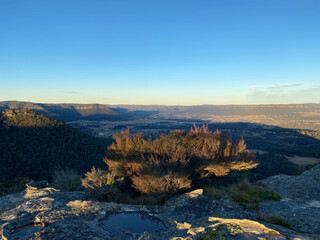 Spectacular views from a mountain-top lookout. Mountains in the horizon. Blue mountains, Australia. Grand canyon sunset. Unusual rock formation. Summit of the mountain.