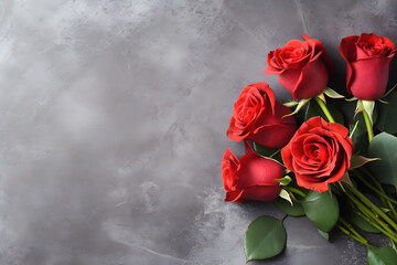 Red roses bouquet on dark stone background