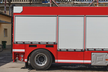 A state-of-the-art firetruck, equipped with advanced rescue technology, stands ready with its skilled firefighting team, prepared to intervene and respond rapidly to emergencies, ensuring the safety