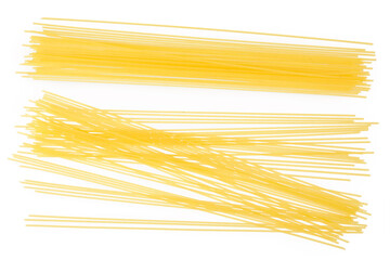 uncooked spaghetti or yellow pasta isolated on white background. Top view. Flat lay