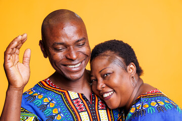 Happy man and woman couple laughing, having fun and hugging portrait. Smiling girlfriend holding...