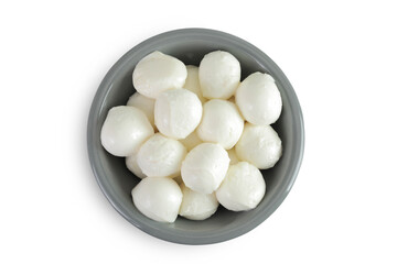 Mini mozzarella balls in a grey ceramic bowl isolated on white background with full depth of field. Top view. Flat lay.