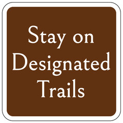 Obraz premium Directional hiking trail safety sign stay on designated trails