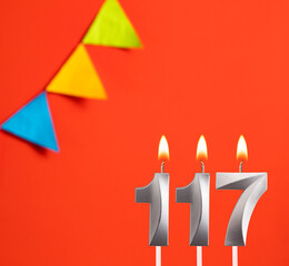Birthday card - Number 117 candle in orange background