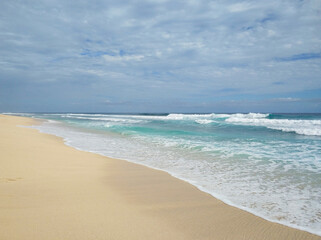 Fototapeta na wymiar A magnificent sea beach landscape. White sand on the ocean beach