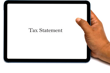 hand holding a computer tablet with a screen displaying the word tax statement
