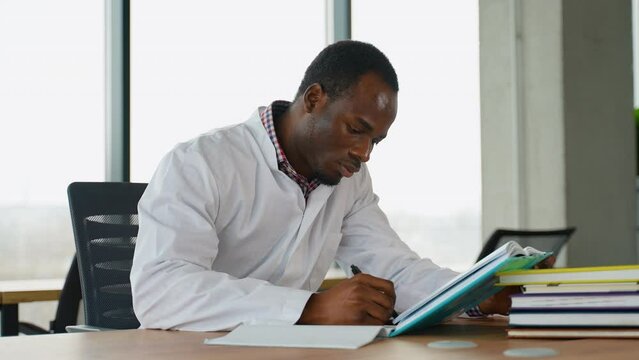 Black guy nursing student intern is preparing for the exam