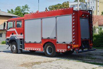 A state-of-the-art firetruck, equipped with advanced rescue technology, stands ready with its...