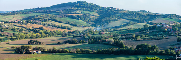 Panoramic beautiful rural landscape of Toscana. Green fields and meadows