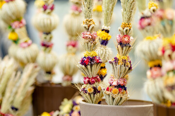 Traditional Lithuanian Easter palms known as verbos sold on Kaziukas, Easter market in Vilnius.