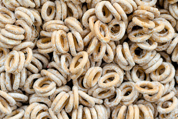 Loaves of organic bagels for sale at outdoor farmers market in Vilnius. Traditional spring fair in capital of Lithuania.