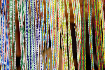 Details of a traditional colorful Lithuanian weave. Woven belts as a part of national Lithuanian...