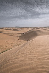 Fototapeta na wymiar The Badain Jaran Desert is a desert in China, vertical image