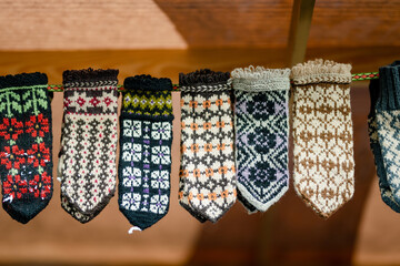 Colorful warm knitted mittens sold on Easter market in Vilnius.
