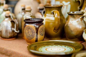 Ceramic dishes, tableware and jugs sold on Easter market in Vilnius. Lithuanian capital's annual traditional crafts fair is held on Old Town streets.