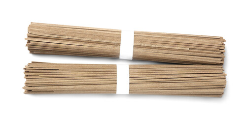 Uncooked buckwheat noodles (soba) isolated on white, top view