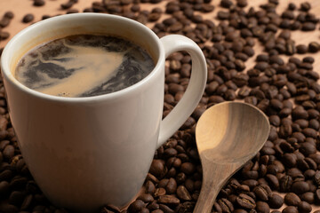 coffee cup with wooden spoon