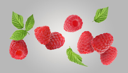 Fresh ripe raspberries and green leaves falling on grey background, banner design