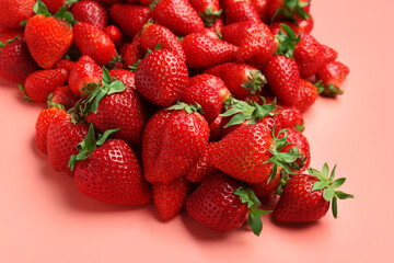 Fresh strawberries on pink background