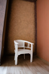 chair in the corner of the room