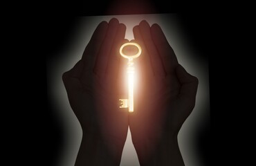 Human hand hold the key to apartment