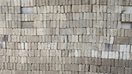 Raw traditional Indonesian bricks being dried in the sun