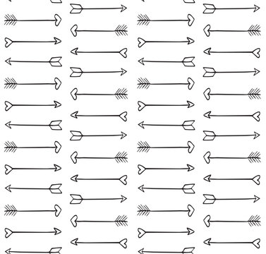Vector seamless pattern of hand drawn sketch Valentine’s cupid arrows isolated on white background