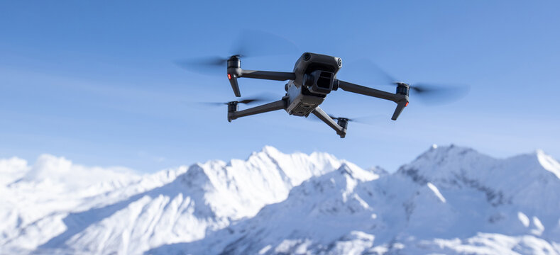 Flying drone in high altitude mountains