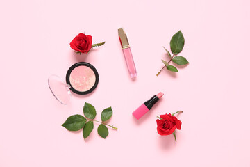 Obraz na płótnie Canvas Composition with makeup products and beautiful red rose flowers on pink background